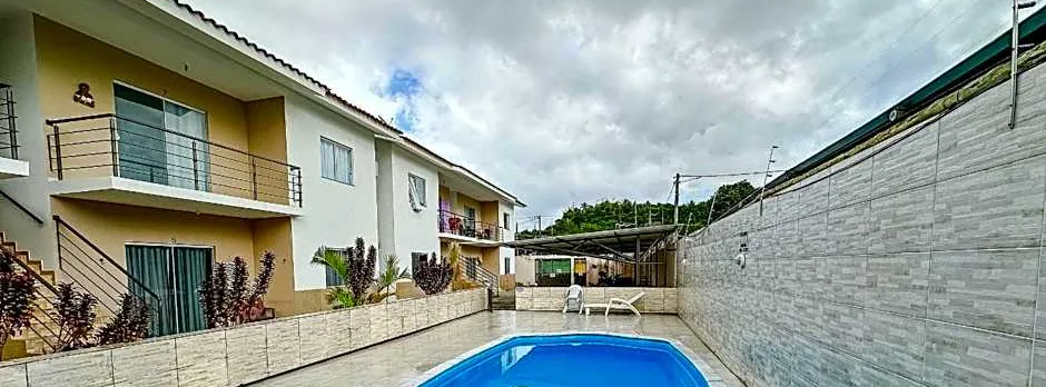 Apto Térreo a 900m da Barraca do Gaúcho, condomínio com piscina e área Gourmet