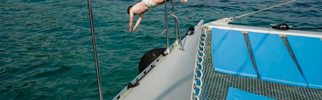 Corfu catamaran cruise with Greek lunch, drinks and optional transfers