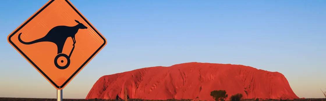 Quarter Uluru self-balancing scooter and sunset