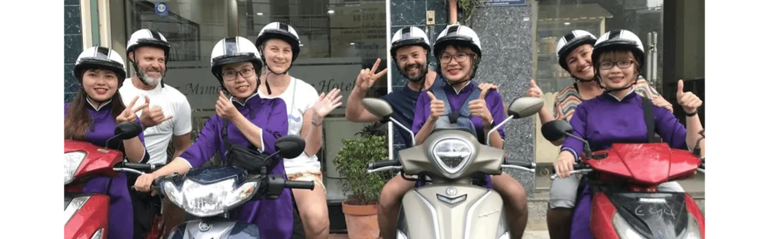 Ho Chi Minh City scooter food tour by night with a local host