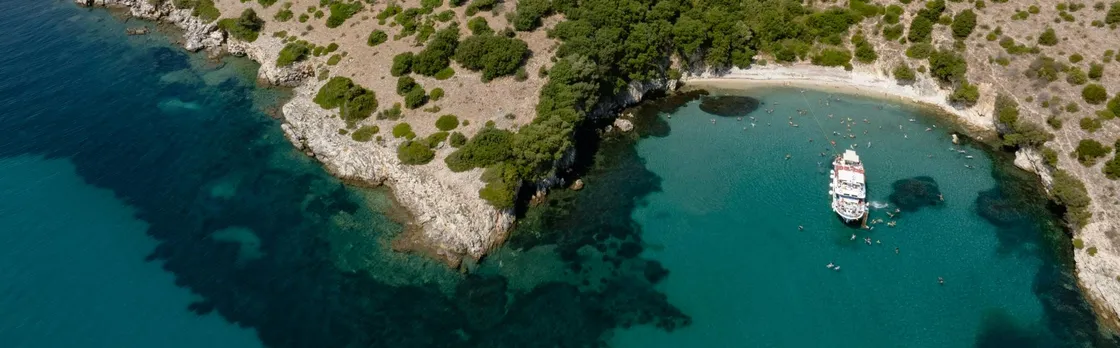 Boat trip from Corfu to Sivota with local lunch, Blue Lagoon and optional transfers