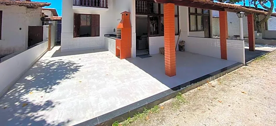 Casa Aconchegante à Beira Mar com estacionamento.