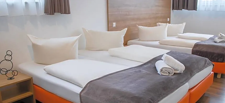 Orange Hotel und Apartments
