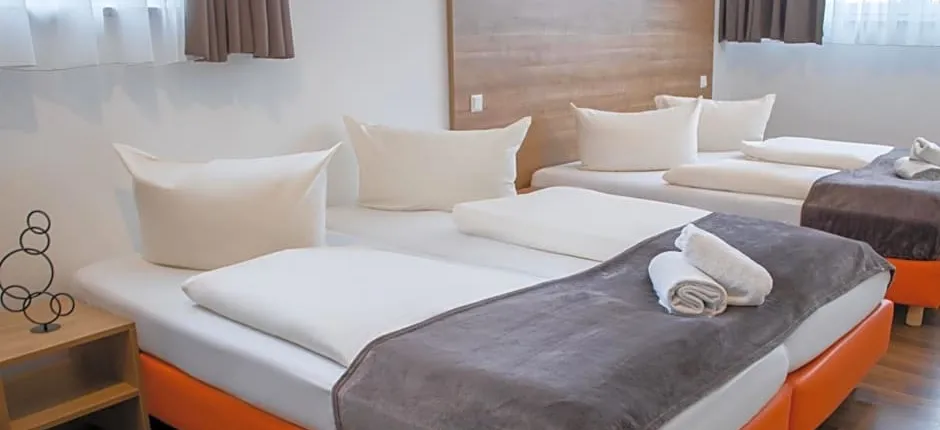 Orange Hotel und Apartments