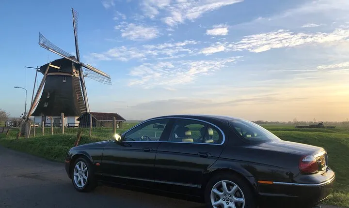 Windmill Private Tour in classic Jaguar I Amsterdam outskirts