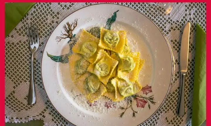 Dining experience at a local's home in Parma with show cooking