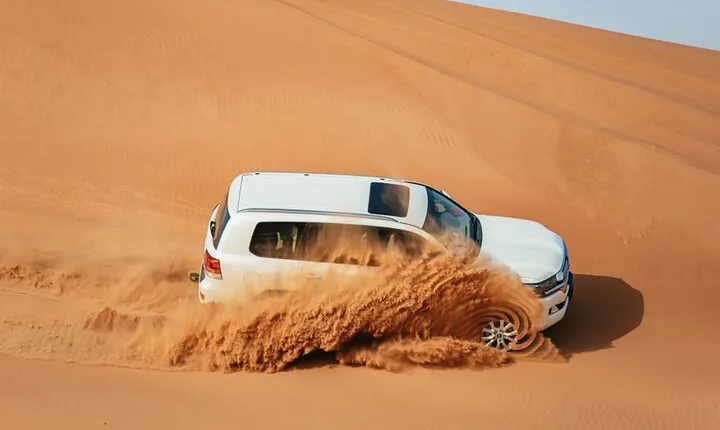 Dubai: Jeep Desert Safari, Camel Ride, and Quad Bike Tour