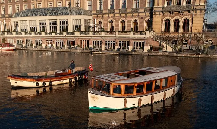 Amsterdam 2 Hour Small-Group Canal Cruise with Dutch Snacks & Bar