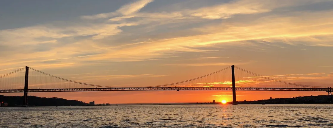 Lisbon sunset sail with drinks and snacks