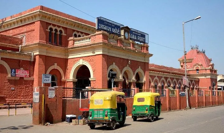 Arrival and departure assistance at Agra railway station , bus stand