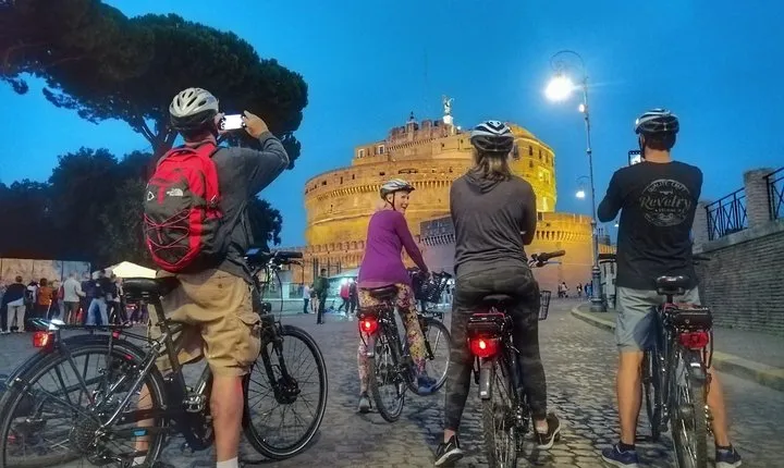 Rome at sunset is magic on two wheels
