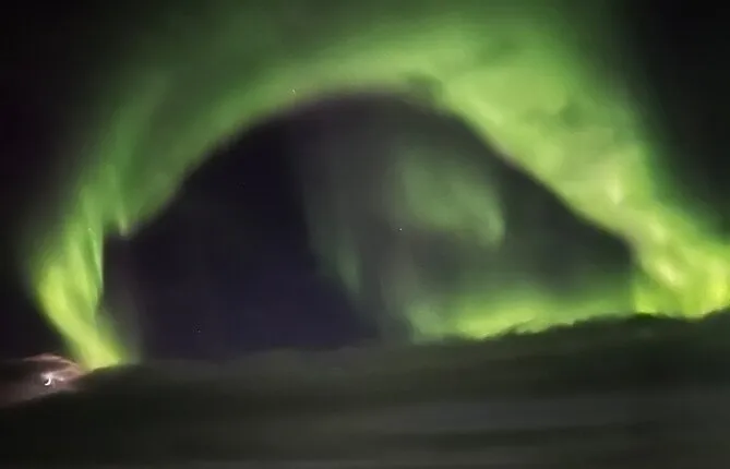 Hunt the Magical Northern Light from a Snowmobile Seat