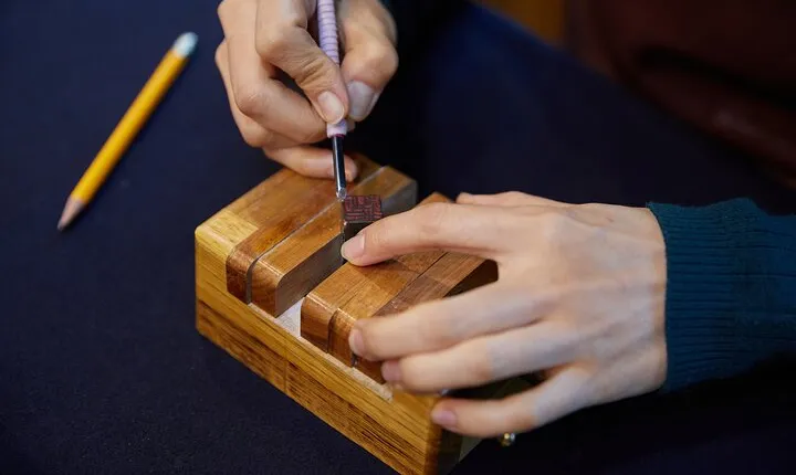 Carving a Korean Stone Seal with Jeongju in Insadong Seoul.