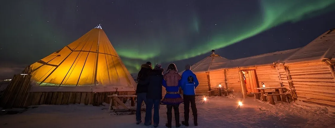 Dinner at a reindeer camp and northern lights
