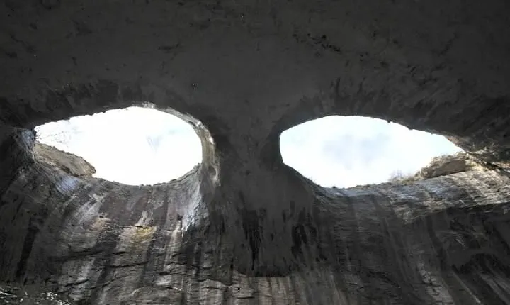 The Eyes of God natural wonder Saeva Dupka cave and Glozhene Monastery day trip from Sofia