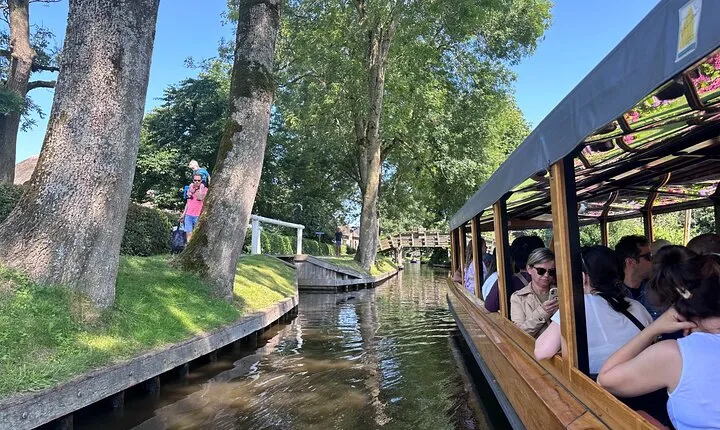 Transfer to Giethoorn,. with optional 1 hour guided canal cruise