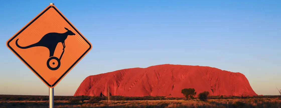 Quarter Uluru self-balancing scooter and sunset