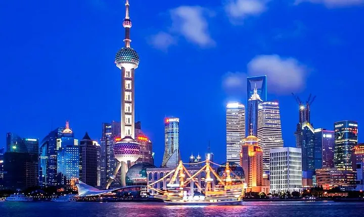 Shanghai Night River Cruise Tour with Xinjiang Style Dining Experience