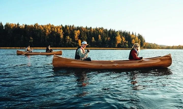 Premium guided Canoe Tour in lake Plateliai Handcrafted inventory and picnic set
