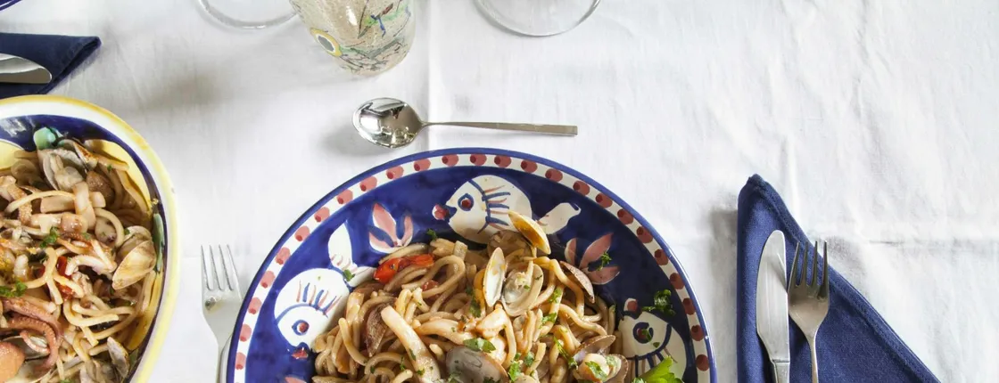 Market tour and dining experience at a Cesarina's home in Taormina