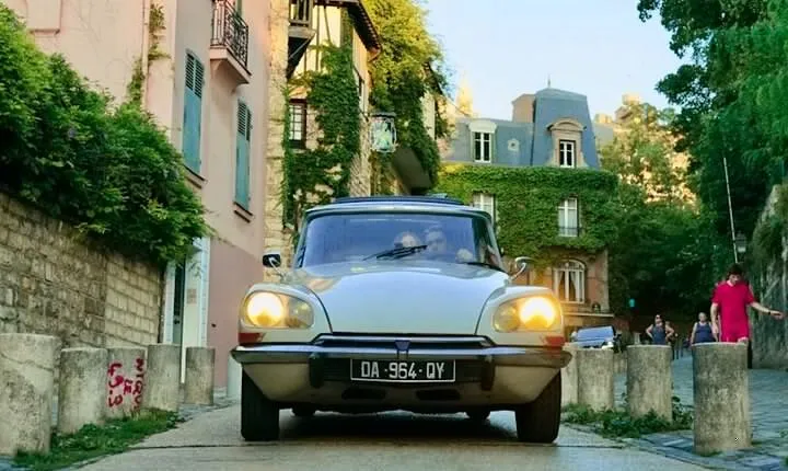 The Essentials of Paris in a Classic Open Top Car Citroën DS