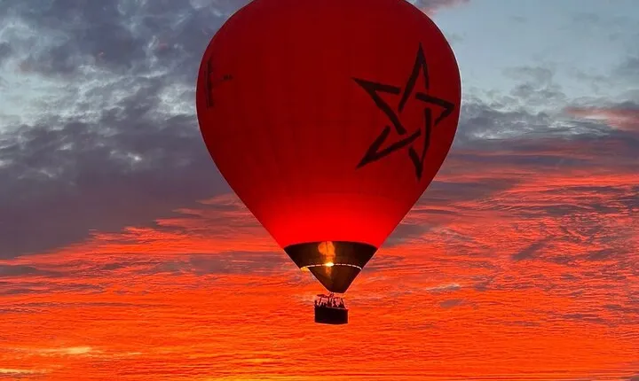 Hot air balloon flight in the desert with camel ride