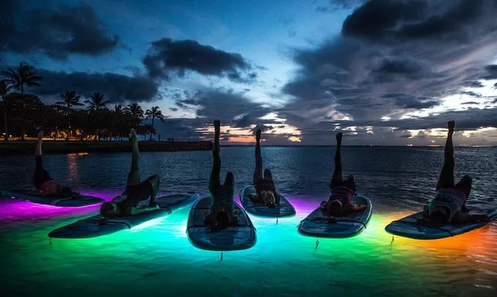 Night SUP Yoga in Honolulu, Hawaii