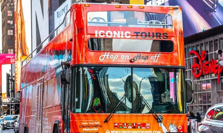 NYC Night Bus Sightseeing Tour with Free Statue of Liberty Cruise