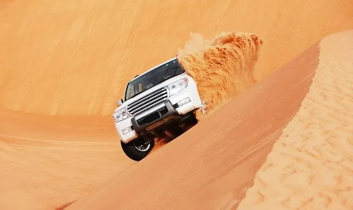 Desert Safari Red Dunes with Camel Ride, Sandboard, BBQ and Shows