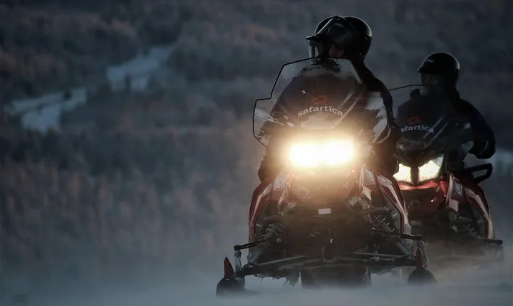 Evening Escape - Snowmobile safari and campfire in Rovaniemi