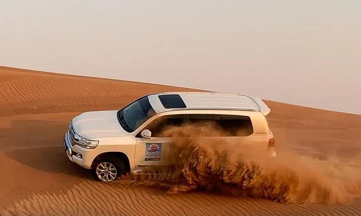 Dubai Morning Desert Safari: Camel Ride & Sandboarding!