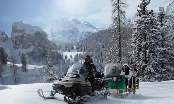 From Bolzano - Snowmobile + Sledding and The Great Dolomites Road Private Tour