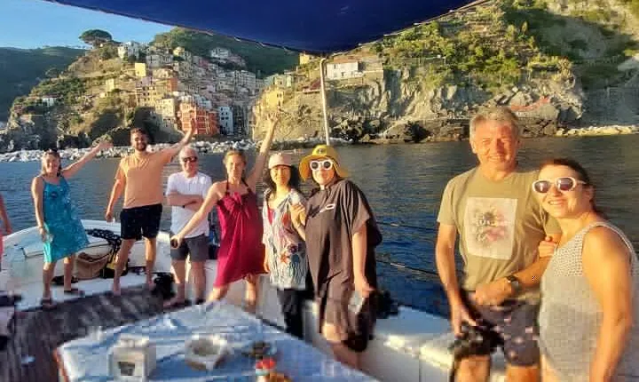 Sunset Cinque Terre Boat Tour with a traditional ligurian gozzo from Monterosso