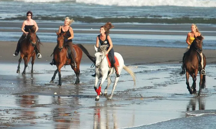Riding a Horse to Enjoy the Extremely Black Sand Beach