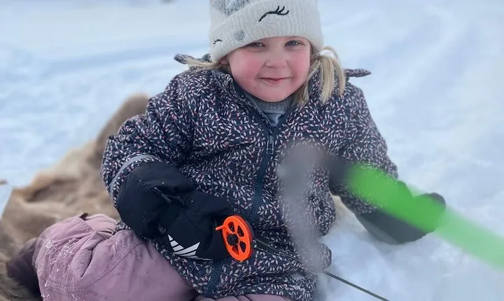 Lapland Winter Adventure Snowmobiling and Ice Fishing Experience