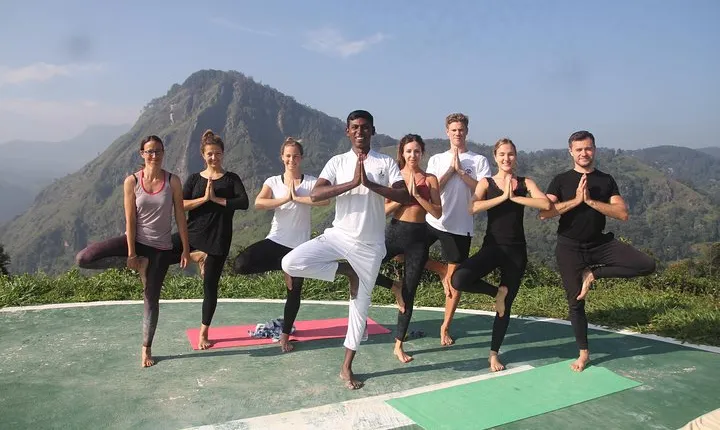 Yoga Near Little Adams peak With Sunrise .