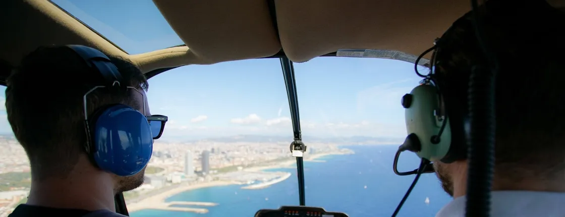 Helicopter Flight and Sailing Experience in Barcelona