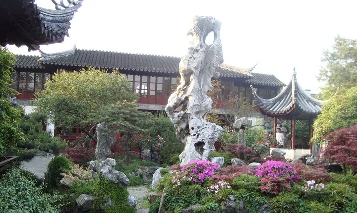Shanghai to Suzhou by bullet train visit gardens and canal tour.