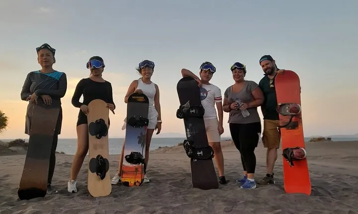 Sandboarding in the Mogote Sand Dunes in La Paz