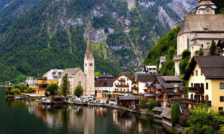 From Vienna: Day Tour to Hallstatt and Salzburg with Boat Ride 