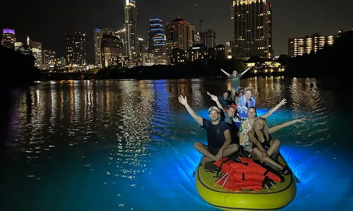 Giant Glow Paddleboarding the Downtown Skyline with Bats