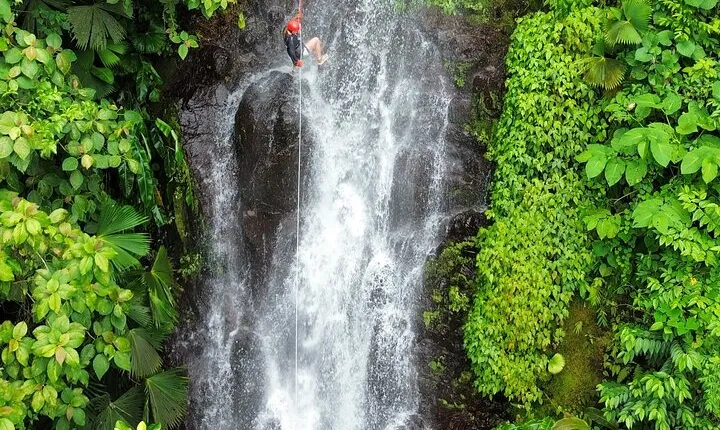 Canyoning Adventure Rappelling Waterfalls in Arenal Volcano