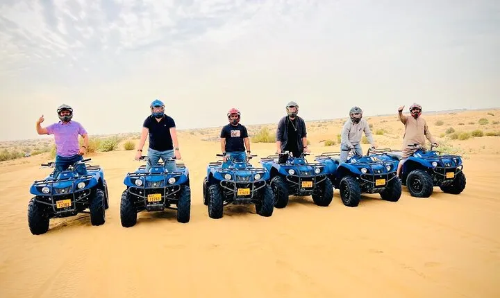 4 Hours Desert Tour with Quad Bike Camel Ride & Sandboard