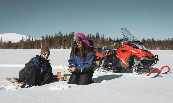 Lappish Lunch Break -Snowmobiling, ice fishing and tasty food