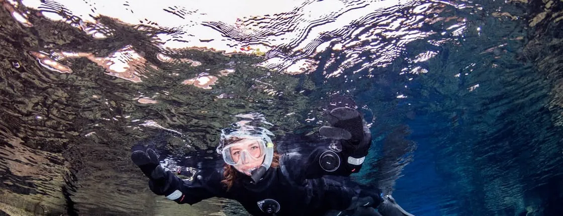 Enjoy a Silfra snorkel tour with pick-up