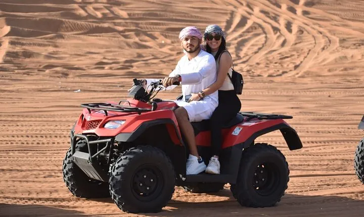 Dubai Evening Desert Safari with Quad Bike, Camel Ride and BBQ