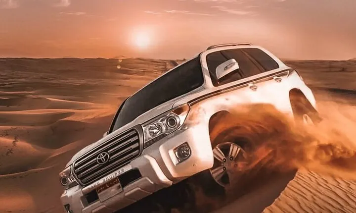 Red Dune Desert Safari Tour with Camel Ride & BBQ Experience 