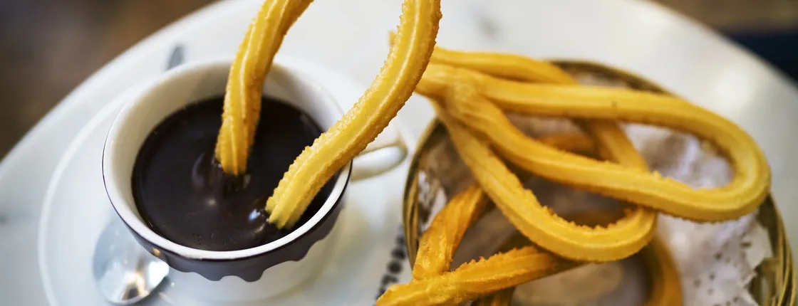 Self-balancing scooter tour in Madrid with chocolate con churros