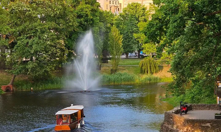 Riga Canal and Daugava Boat Tour with Welcome Drink & Audio Guide