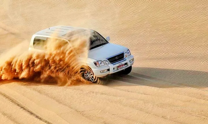 Red Dunes , Sandboarding, Camel Ride & BBQ at Al Khayma Camp